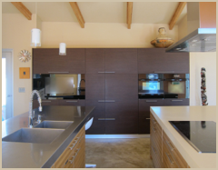 A sense of calm emanates from the use of clean lines and discreet storage in the kitchen.