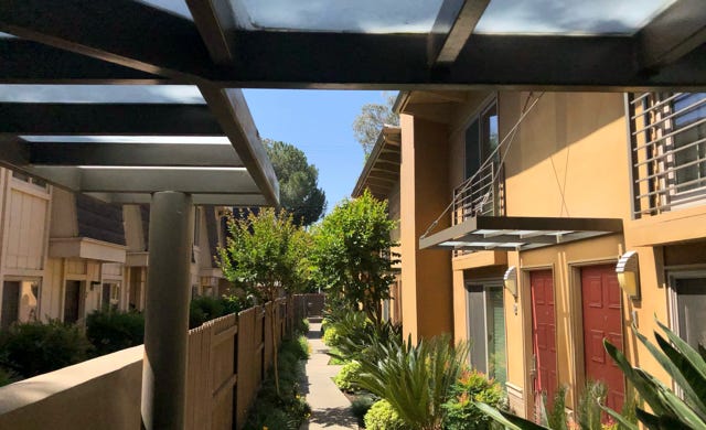 completed side elevation with new indovidual entry canopies